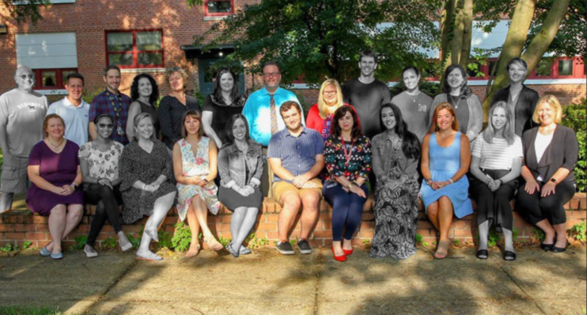 McLean 2019-20 English department poses together for a staff. Teachers depicted in black and white coloring (12 out of the 23) have since left.